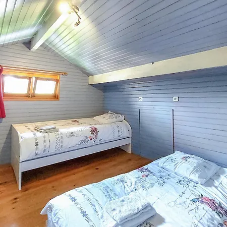 In Prázdninový dům *